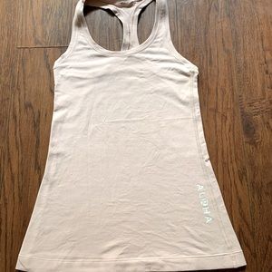 Lululemon top — aloha logo